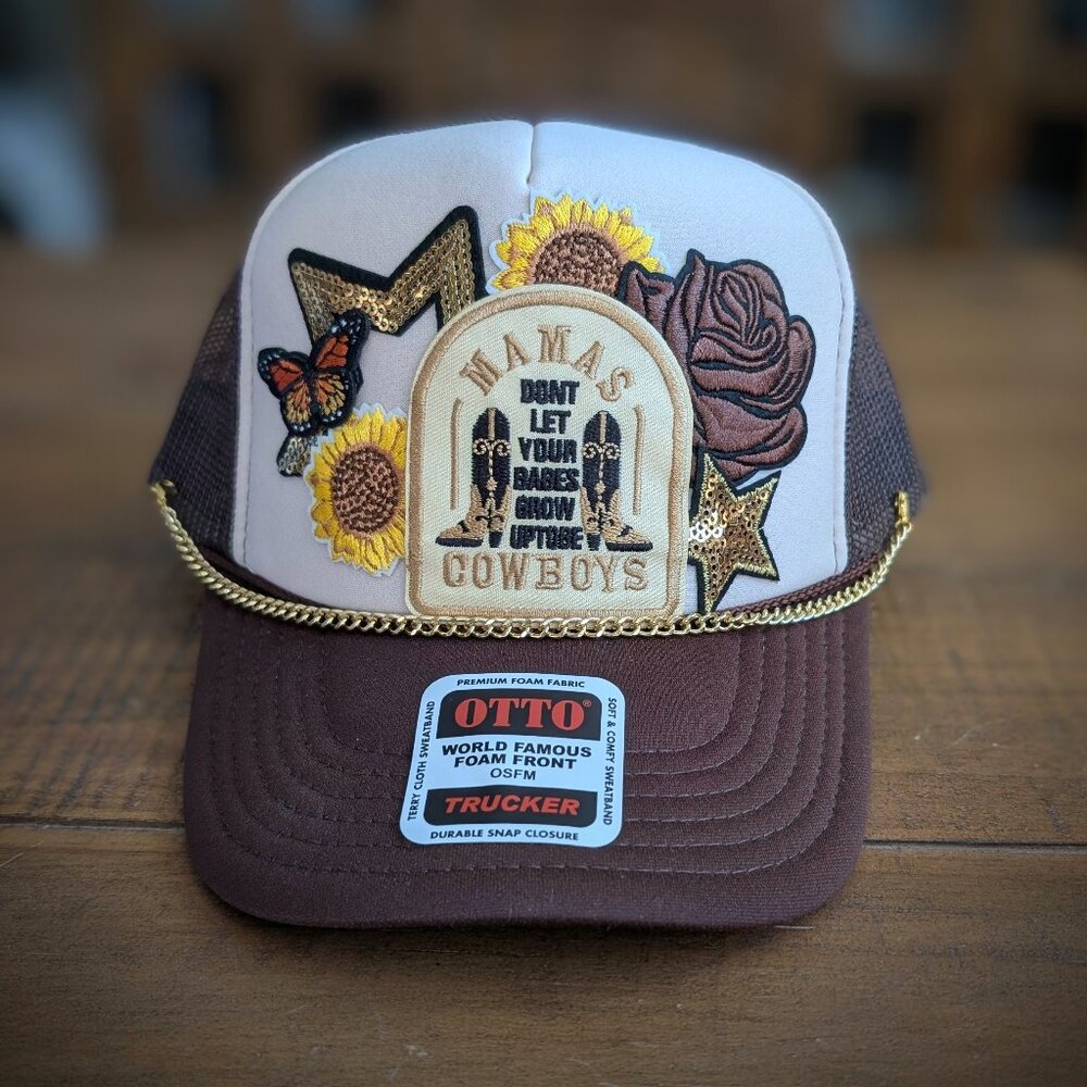 Trucker hat with iron patches and embellishments